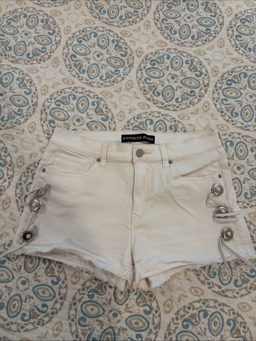 Women’s white denim shorts from express size 10